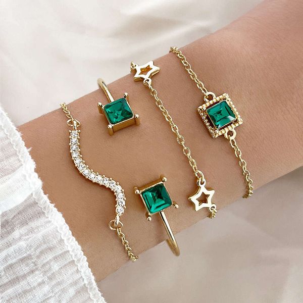 Conjunto de pulsera abierta con diamantes geométricos y estrella de imitación de esmeralda