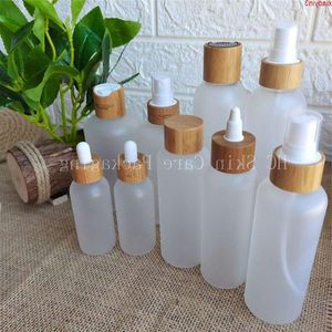 Cosmet vacío 60ml 120ml 150ml 250mlml Botella de plástico PET transparente esmerilado con tapa de bambú Grabado de champú Logogoods Doobk