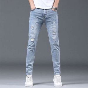 End High Jeans Spring and Automn Season Nouveau produit Brand à tendance Élastique Slim Fit Perforé Perforée pour les hommes Pantalons décontractés pour hommes