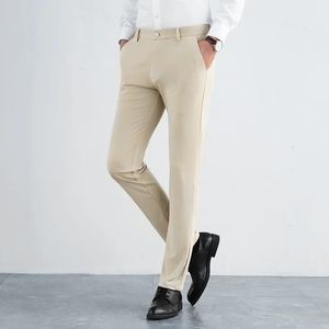 Engeland -stijl mode eenvoudige elegante hoge elastische broek mannen massieve ritssluiting pocket knop veer rechte ijs zijden casual broek 240428