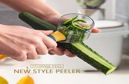 Epacket Fruit Vegetable Tools Peeler avec manche rouleau de peau de peau de rangement de tube de range