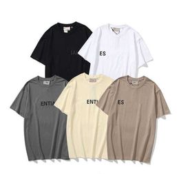 Camisetas esenciales para hombres Diseñador de cofres de doble línea Letras de silicona simples Moda suelta High Street Camiseta de manga corta para hombres Tendencia de ocio