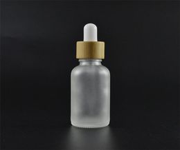 botella de gotero de vidrio de aceite esencial con botella de bambú de bambú de bambú de suero esmer de suero esmerilado de color azul esmeroso 10 ml 15 ml 20 30ml 50ml 21 G25107149