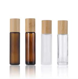 Botella enrollable de aceite esencial 5 ml 10 ml 15 ml Botellas de muestra de perfume de vidrio recargables transparentes esmeriladas con bola de rodillo de acero inoxidable y tapa de bambú Envase cosmético