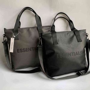 Essentials Diagonal Straddle Bag Mode pour hommes et femmes Sac à bandoulière unique Portable à double usage Sac de loisirs Porte-documents de bureau 220630