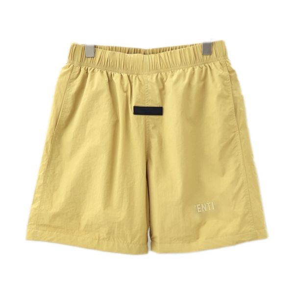 essentialshirts femmes shorts de créateur hommes jaune léger cordon de serrage short en nylon survêtement décontracté respirant pantalon d'été hommes poches obliques short cargo