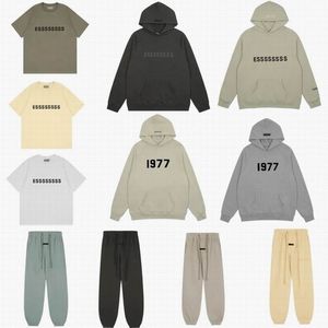 Essentialtshirt Camisas de diseñador Hombres 1977 Sudaderas con capucha Sudaderas para hombre Sudadera con capucha gris Hierro Jerséis para mujer Chándales Jerseys de gran tamaño Streetwear Señora Suéter Pantalones