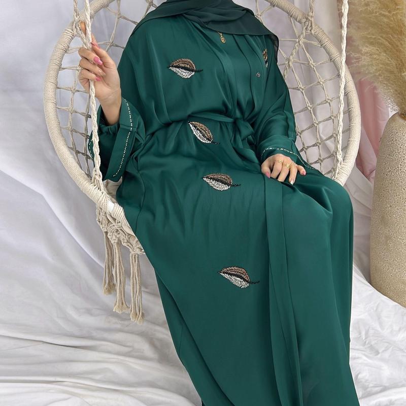 Ropa étnica Dubai primavera y verano vestido de fiesta pluma Color sólido manga larga bordado vestido suelto con cordones chica