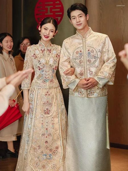 Vêtements ethniques Mariage chinois traditionnel pour femmes Champagne Xiuhe Robe de mariée Eleganct Gold Top Toast Set Femme Groom Tang Costume