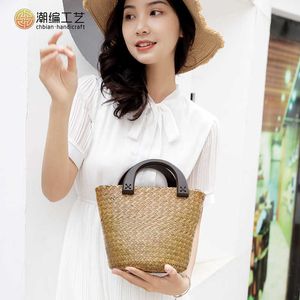 Etnische handgemaakte strogeweven tassen Populair op internet Modieuze draagbare vrijetijdstassen voor dames