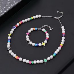 Europe Amérique Mode Mng Perles Parti Collier Bracelet Hommes Femmes Argent Métal Gravé V Lettre Pendentif Perles Chaîne Bijoux Ensembles M01500 M1264A