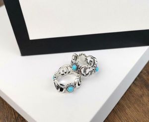 Europa América Estilo retro Hombres Señora Mujer Acero titanio Chapado en plata Flor grabada Configuración de letra G Anillos de turquesa Tamaño 691238887