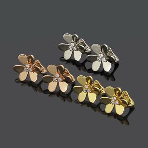 Boucles d'oreilles en titane et acier pour femmes, Style européen et américain, initiales gravées, trois diamants, fleur, 3 couleurs, 299n