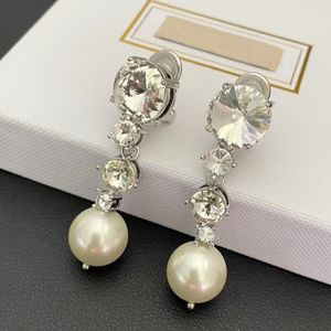 Europe et Amérique Femmes Boucles d'oreilles Luxury Gold plaquettes clignotantes CZ Diamond Designer Mautes d'oreilles pour filles Femme Femme Mariage Beau cadeau