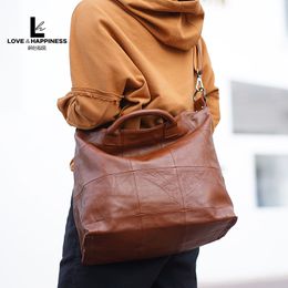 Europe et États-Unis nouveau design de niche sac à bandoulière en cuir pour femme grande capacité portable loisirs sac d'ordinateur à grille à anneaux sac Boston