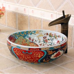 Style européen fleurs et oiseaux vanités de salle de bain de luxe chinois Jingdezhen Art comptoir lavabo en céramique pour les pieds