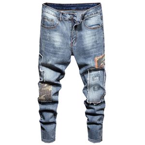 Europese Amerikaanse stijl beroemde merk herenmode jeans 2021 camouflage patchwork stretch denim broek gat slanke broek