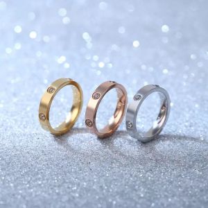 Bague en acier au titane européenne et américaine intégrée à la mode en or rose en acier inoxydable à six diamants