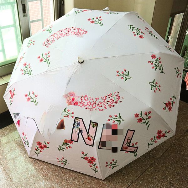 Paraguas creativo famoso europeo y americano, protección solar plegable automática, protección Uv, paraguas de sol con pegamento negro, paraguas de regalo para mujer