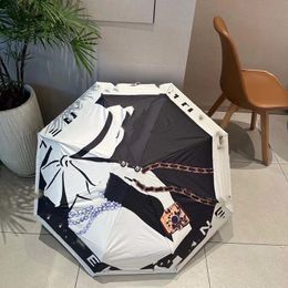 Parapluie de marque de mode européenne et américaine pliant parapluie à ouverture automatique Protection solaire colle noire Protection UV parasols pour femmes