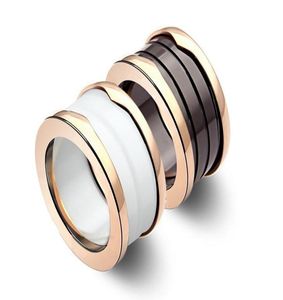 Europese en Amerikaanse mode -keramische ringboogversie Inside Lettering Black -and White Ceramic Thread Couple Ring5912945