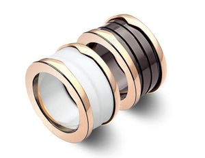 Version d'arc de l'anneau céramique de la mode européenne et américaine à l'intérieur du lettrage du fil en céramique noir et blanc Ring3403308
