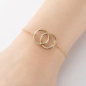 Bracelet pour femme à double boucle de mode européenne et américaine ins bracelet en acier au titane pour femme plaqué or 18 carats simple bracelet de tempérament géométrique