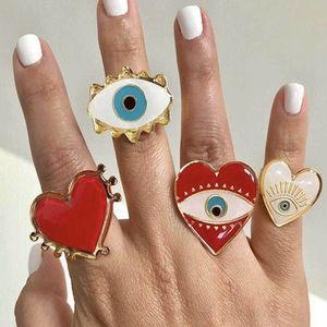Europese en Amerikaanse mode ingeschakeld rood hart liefde ring creatieve 18K glooge boze oog verstelbare ring sieraden