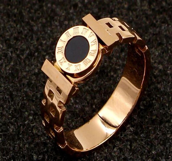 Modelos europeos y americanos pastel redondo negro números romanos correa doble barra transversal anillo de oro rosa moda titanio acero marea fema1324072