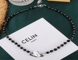 Collier de lettre de perle noire européenne et américaine Collier Fashion Punk Style Silver Diamond Satellite Clicule Chaîne Femelle Hig2889590