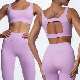 Soutien-gorge de sport de conception creuse de couleur unie ajustée européenne et américaine taille haute Nude Feel Fitness Pantalon Yoga Suit