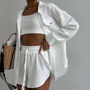 Vêtements pour femmes européennes et américaines 2023 Printemps Nouveau produit Col rabattu Chemise ample Short taille haute Ensemble deux pièces décontracté à la mode