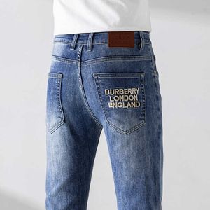 Jeans européens de Paris Paris / Été pour hommes Elastic Slim Fit Petits pieds droits Pantalons de jean décontracté de mode