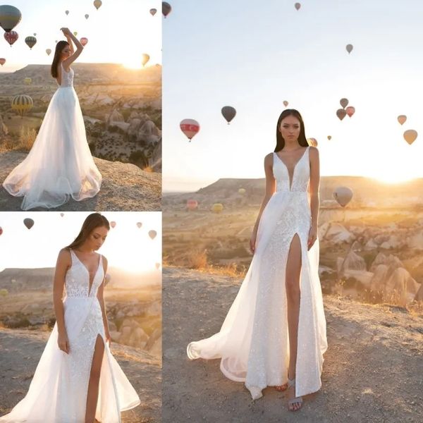 Eva Lendel Últimos vestidos de novia Cuello en V Sin espalda Encaje Sin mangas Apliques Bohemio Muslo Aberturas altas Vestidos de novia Una línea Vestido de novia