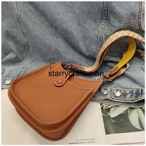 Evelyn Schoudertassen Vertrouwde Luxe Leren Tas 2024 Nieuwe Echte Evelyn Tc Toplaag Koeienhuid Brede Schouderriem Enkele Schouder Crossbody Wohave-logo HBM7WX