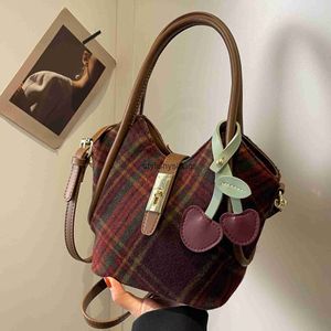 Bolsos de noche Bolso de alta costura de otoño para mujer 2023 Nuevo bolso de cesta de moda de nicho Cubo a cuadros de lana H240323