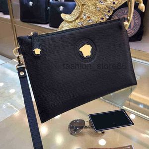 avondtassen Designer Lady Bag Guangzhou Nieuwe Fashion Spirit Guy Beauty Head Heren Lederen Handtas Grote capaciteit cliptas Men