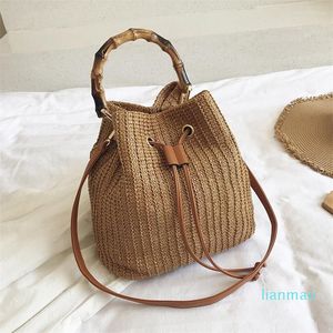 Bolsos de noche, bolso de cubo de paja a la moda, bolso de mano para mujer, bolso bohemio con asa de bambú para playa, viaje de Bali, bolso bandolera con cordón grande para hombro