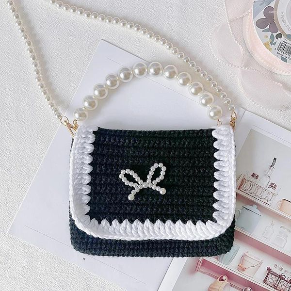 Bolsas de noche Kuroyabu Alta calidad Ocio simple Pequeño bolso cuadrado Personalidad Chic con arco Tejido a mano Tendencia de moda Crochet