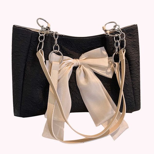 Bolsas de noche grandes capacidad bolso femenino elegante arco para mujeres con bolsas de mango de mango superior