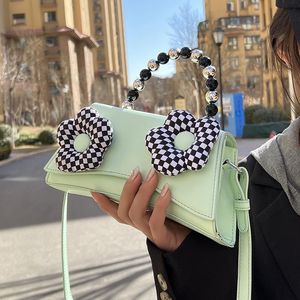 Bolsos de noche estilo chica estudiante pequeño bolso de multitud femenino 2022 verano versátil mensajero de alta textura cuadrado BagEvening