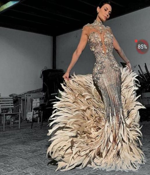 Robe de soirée Yousef Aljasmi Kim Kardashian Sirène High Necy Feather Perles argentées longues cristaux Zuhair Murad Ziadnakad 00118041970