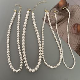 Tout avec un simple collier de perles de bijoux de bijoux de la mode de counaillement de counch de couchage de counchage