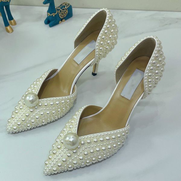Explosivo blanco Baotou zapatos de boda de cercanías noble y lujosa estrella de blogger de moda con las mismas damas de tacón alto atrás serie de sandalias vacías zapatos de tacones elegantes