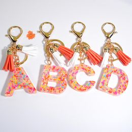 Exquise acryl initiële letter Keychain Women Multicolor alfabet sleutelring met kwast Bag Charm Accessoires Keyholder Geschenken
