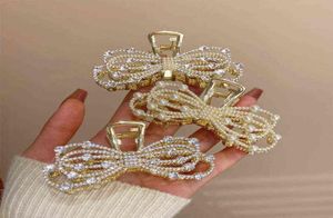 Exquise Bow Pearl Volledige diamantclip Elegante grip Haarclip voor vrouwen Dagelijkse slijtage Sieraden Geschenken Haaraccessoires voor vrouwen T2208081709208