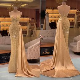 Exquisitos vestidos de noche de sirena dorada con tren desmontable con cuentas de cristal Vestidos De Fiesta Dubai árabe vestido de fiesta