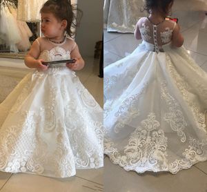 Exquisito encaje Vestidos para niñas de flores Lindo cuello redondo Mangas casquillo Fiesta infantil Ropa de boda Botón trasero Tren de barrido Cumpleaños para niños Vestido formal de primera comunión AL2899