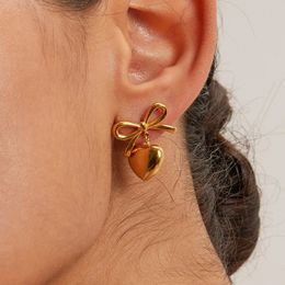 Exquisite roestvrij staal hart bengelen oorbellen voor vrouwen goud kleur bowknot piercing mode sieraden groothandel 240410