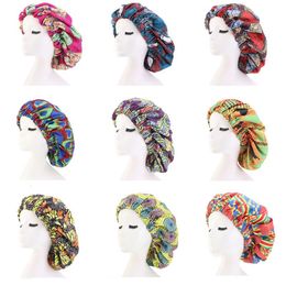 Extra groot formaat Afrikaanse patroon Print Bonnetten Dames Satijn Gevoerde Headwrap Bonnets Night Sleep Cap Winter Hat Lady Turban